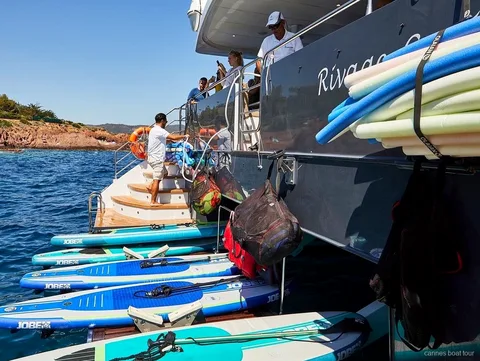 Swimmers near the Lerins Islands on the Cannes full-day boat tour