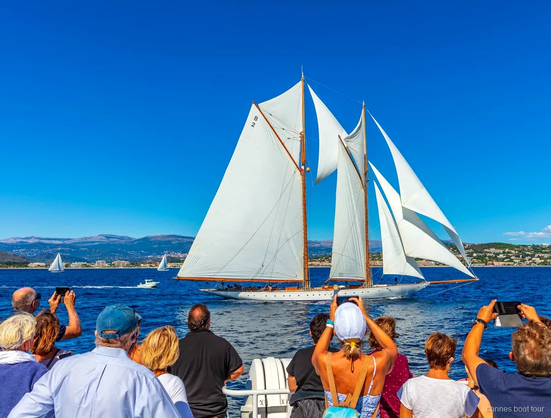 Vintage wooden yacht sailing during the Regates Royales near Cannes
